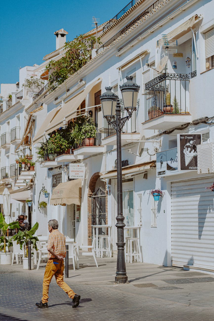 street with buildings and a man walking